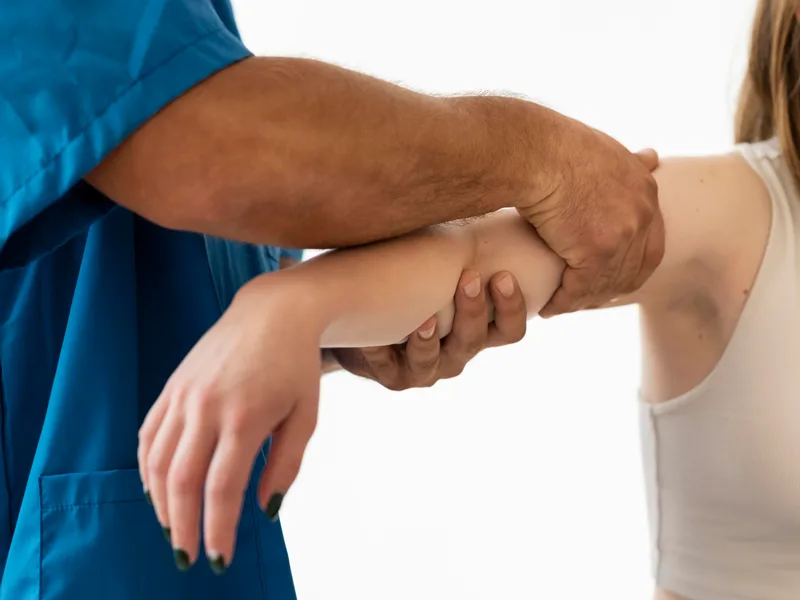 Chiropractic care for elbow pain at Care Natural Wellness Center in Melbourne
